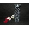 vase med fyrfadslåg og blomstermotiv